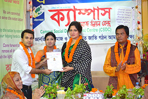 Chief Service Officer of Airtel, Rubaba Dowla, is giving Certificates to the Trainees of Free Computer Training (Batch 130) as Chief Guest; Dr. M Helal is presiding over. (2014)